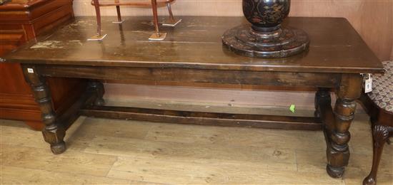 An 18th century style oak refectory dining table L.200cm